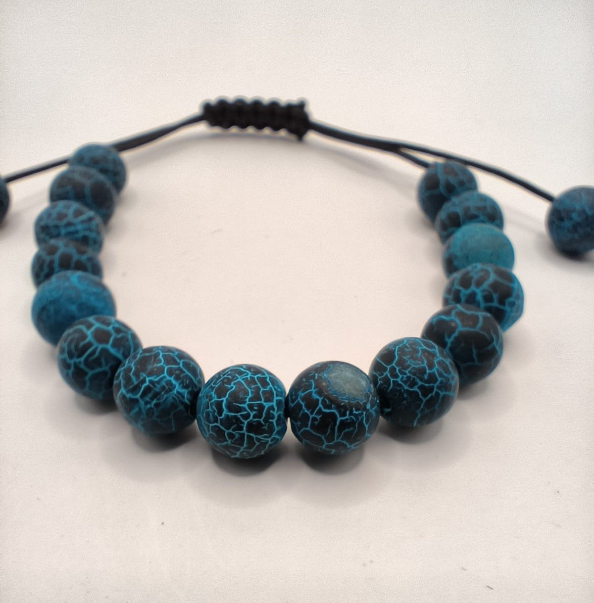 Bratara reglabila albastru cu snur negru