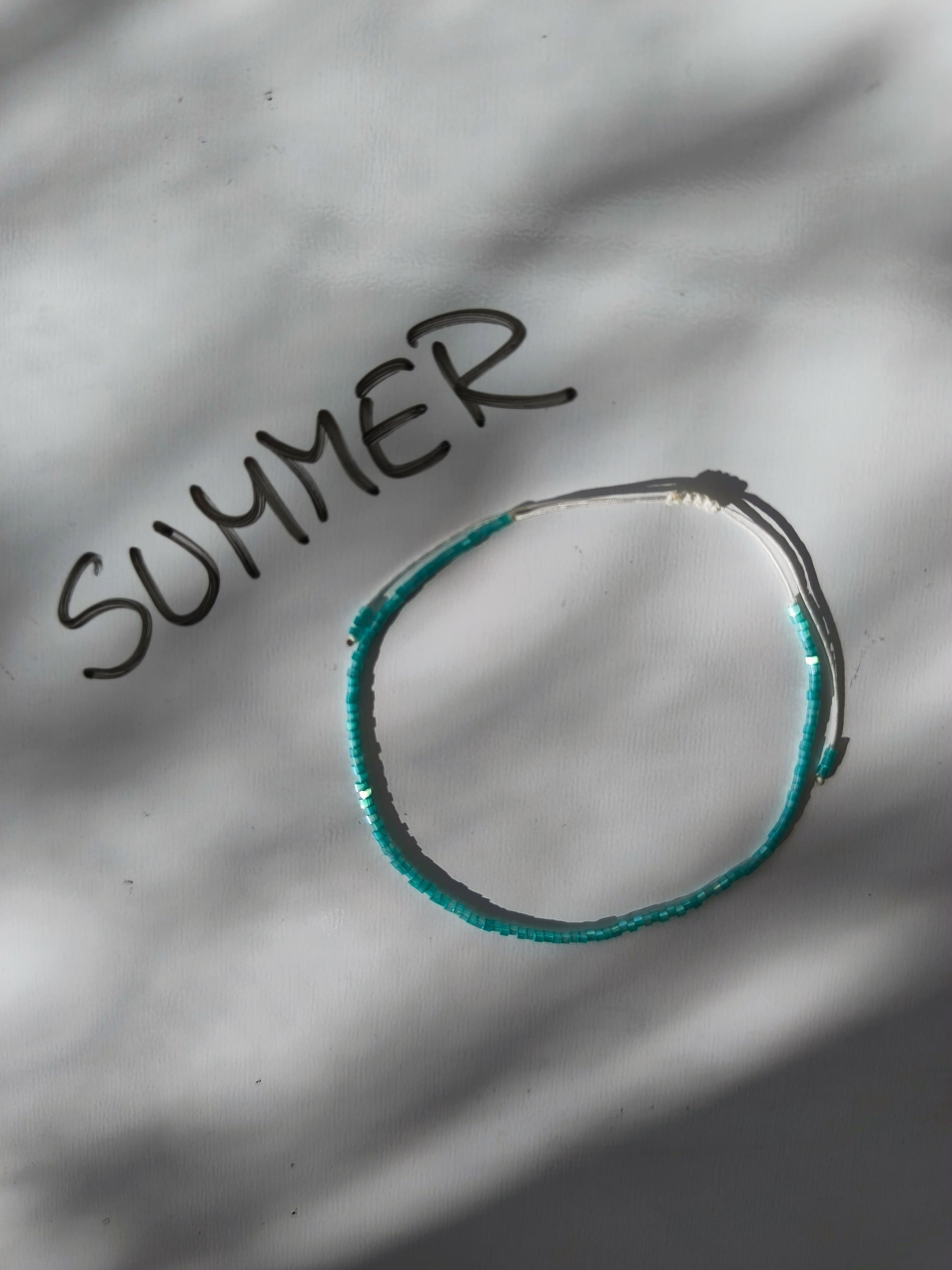 Bratara de picior reglabila cu Miyuki turcoaz ochi de pisica – snur alb