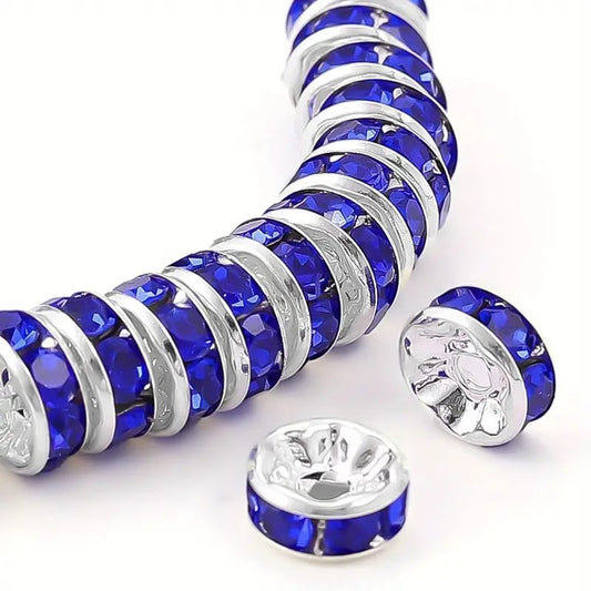 DIstantiere rondele argintii cu strasuri albastre 6x2mm