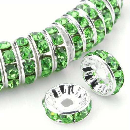 Distantiere rondele argintii cu strasuri verzi 6x2mm