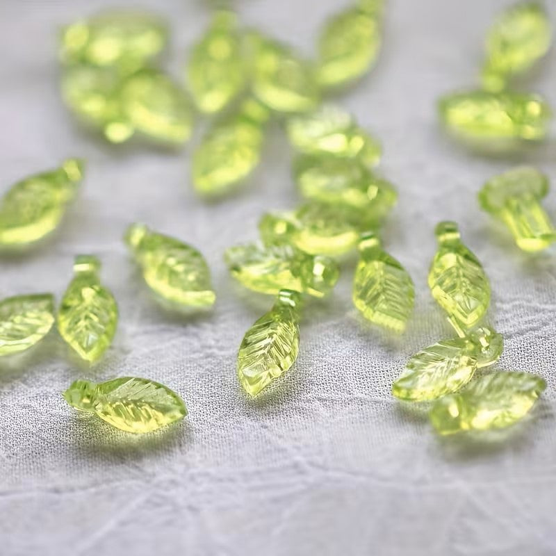 Margele acrilice frunza 8x5mm verde deschis