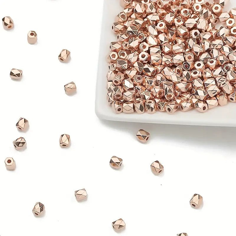 Margele acrilice hexagonale 4mm rose gold