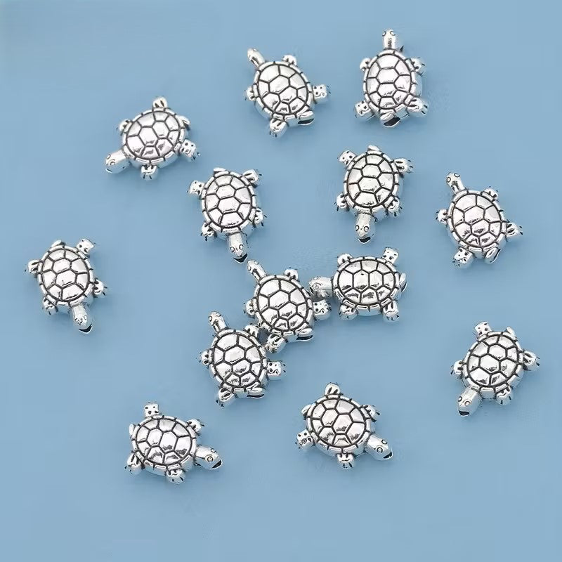 Margele metalice broasca testoasa 10x8mm argintiu