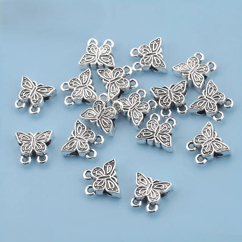 Margele metalice cu fluture si 2 prelungiri 11x10mm argintiu