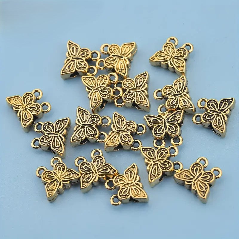 Margele metalice cu fluture si 2 prelungiri 11x10mm auriu