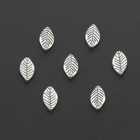 Margele metalice frunza 9x6mm argintiu