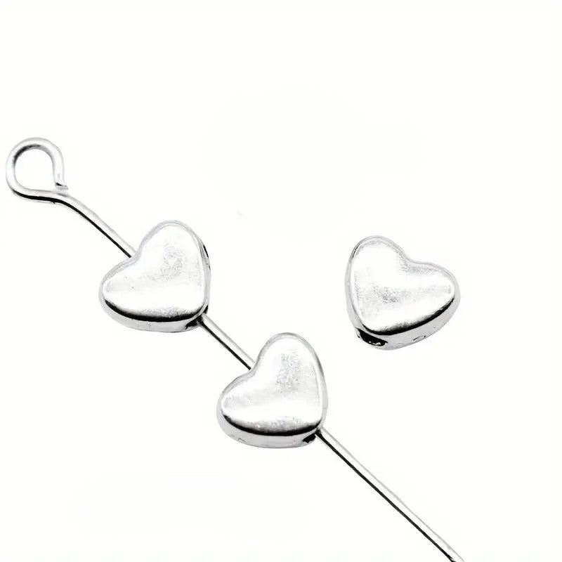 Margele metalice inima 6x5mm argintiu