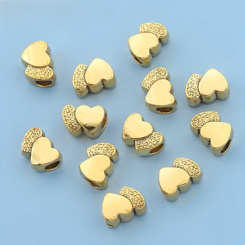 Margele metalice inima dubla 12x9mm auriu