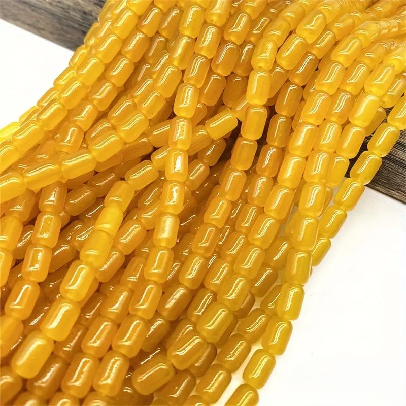 Margele sticla cilindrice 9x6mm galben