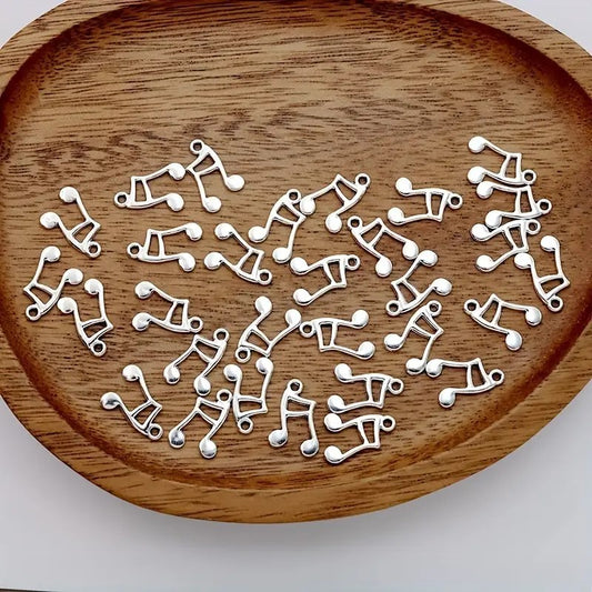 Pandantiv note muzicale 16x12mm argintiu
