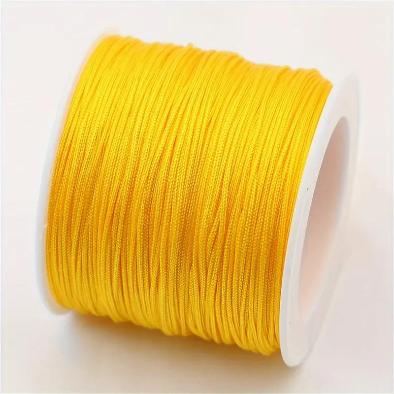 Snur Shamballa nylon galben 0.8mm rola 10m