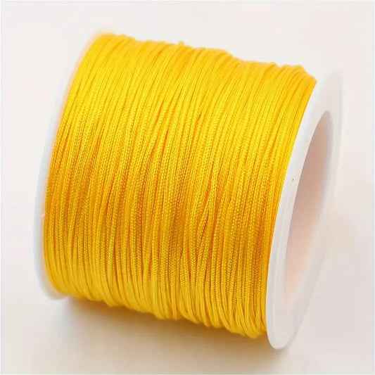Snur Shamballa nylon galben 0.8mm rola 10m