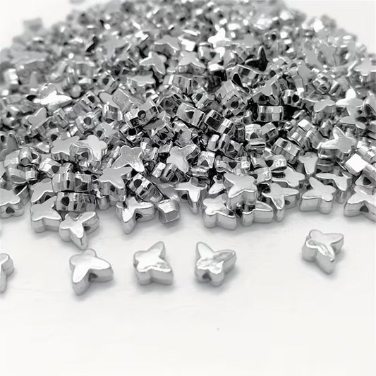 Margele acrilice fluture 6mm argintiu