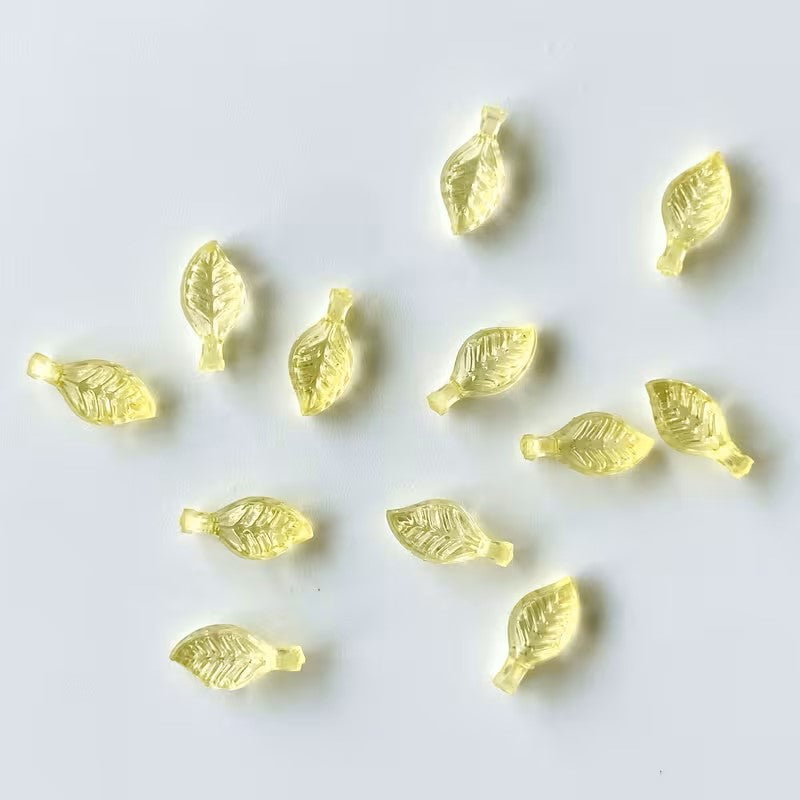 Margele acrilice frunza 8x5mm galben