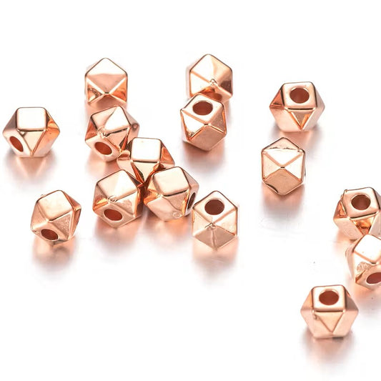 Margele acrilice geometrice 4mm rose gold