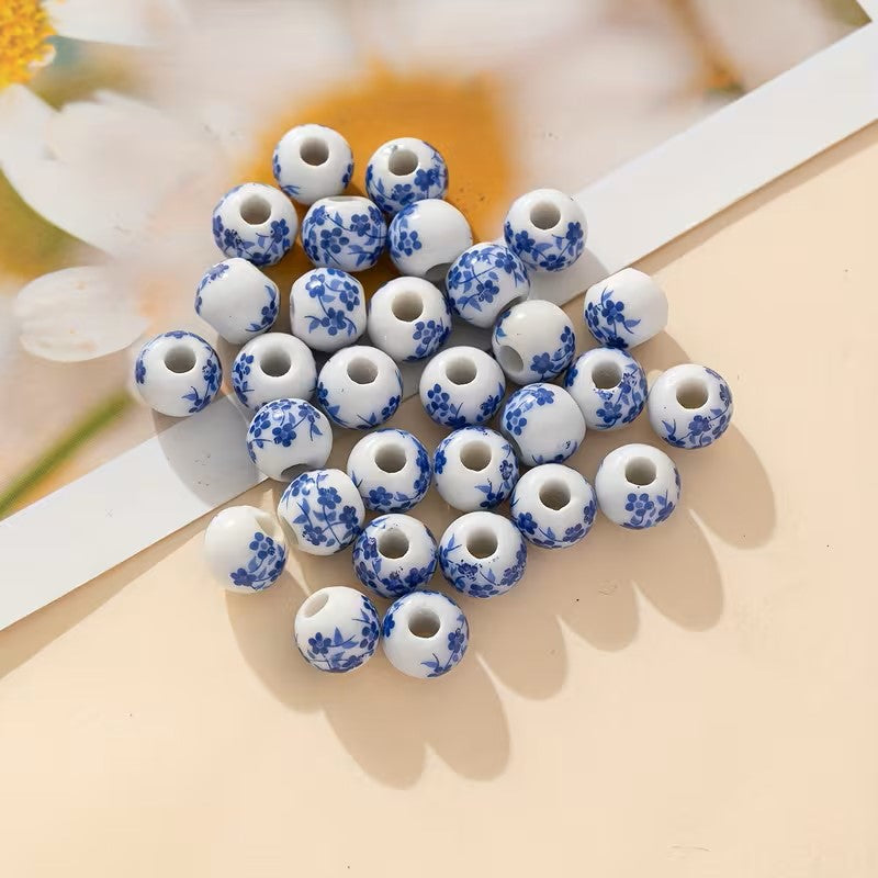 Margele din portelan 8mm alb cu model flori albastru