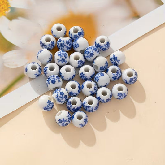 Margele din portelan 8mm alb cu model flori albastru