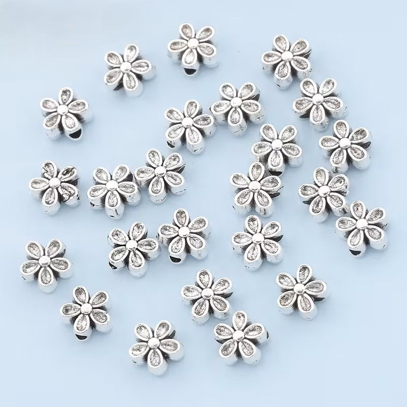 Margele metalice floare 7mm argintiu