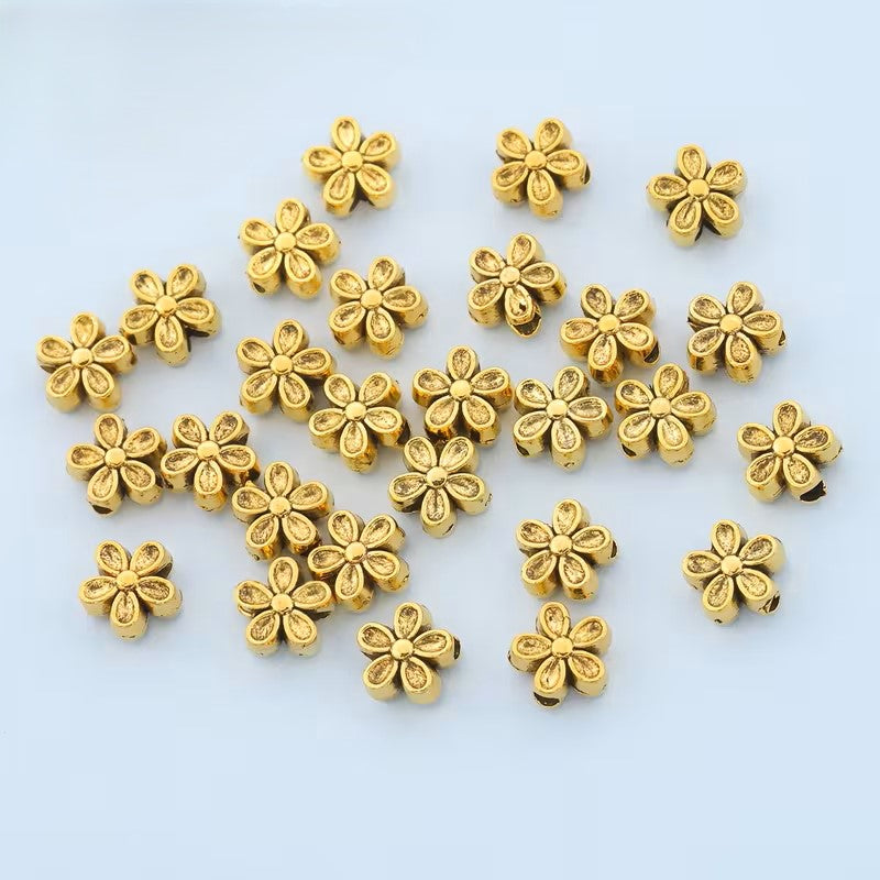 Margele metalice floare 7mm auriu