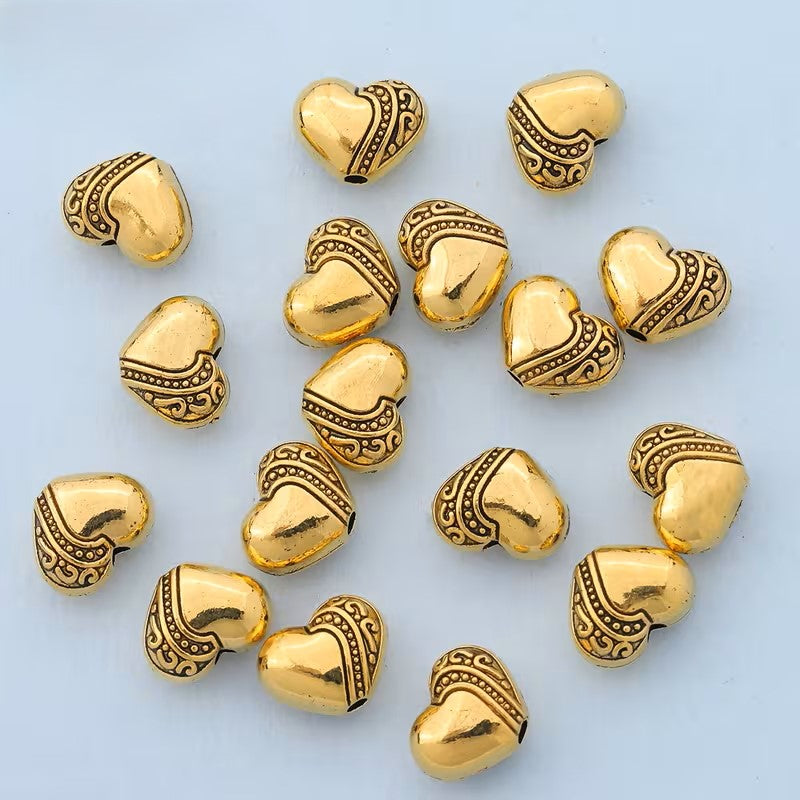 Margele metalice inima 9x7mm auriu