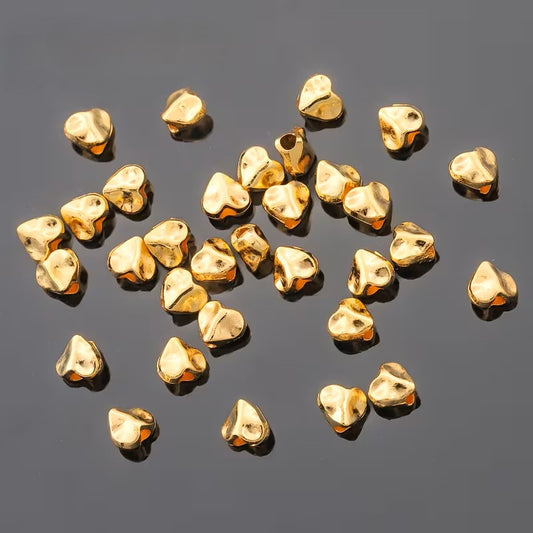 Margele metalice inima abstract 5mm auriu