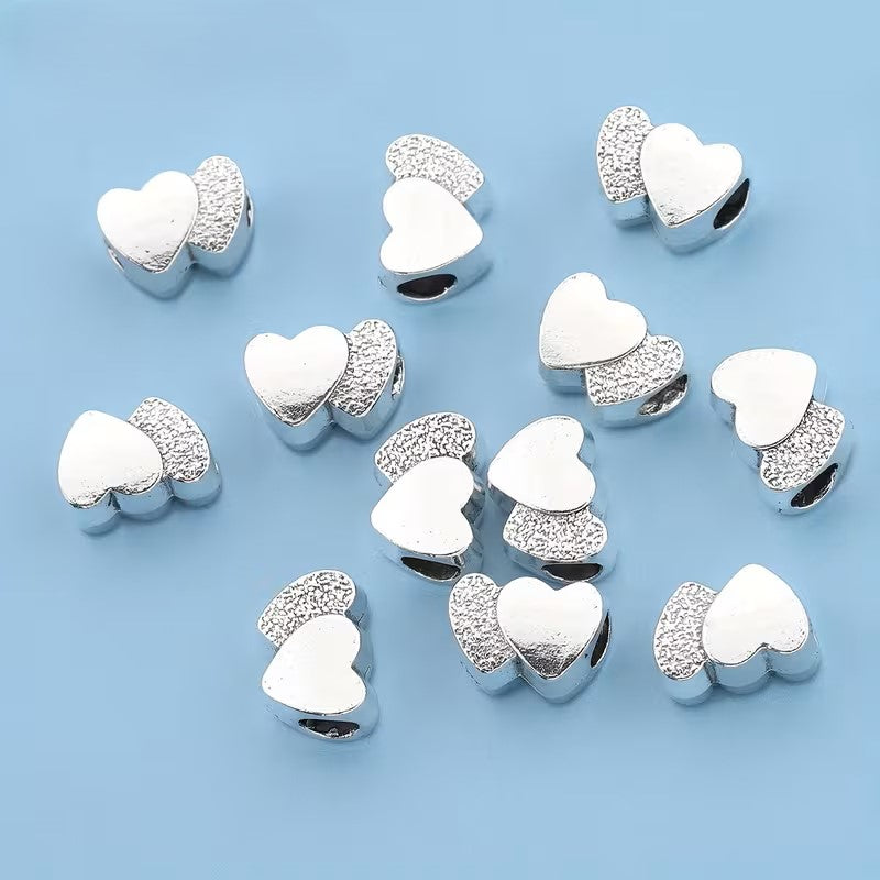 Margele metalice inima dubla 12x9mm argintiu