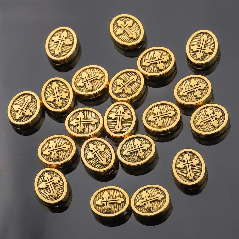 Margele metalice ovale cruce 11x9mm auriu