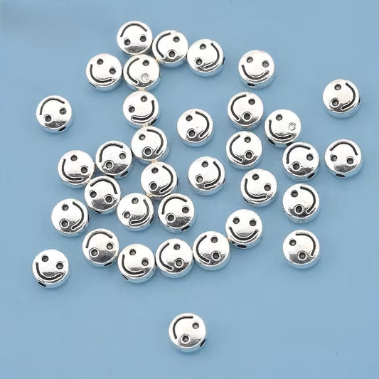 Margele metalice zambet 6mm argintiu