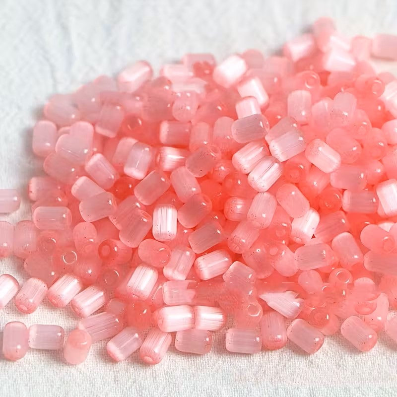 Margele sticla tub ochi de pisica 6x4mm roz
