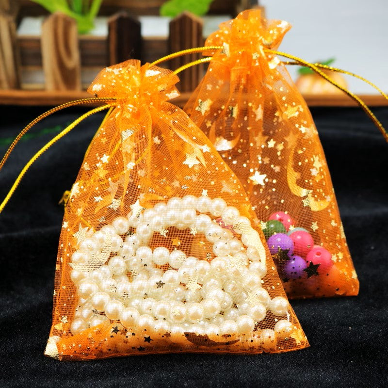 Saculet organza portocaliu cu stele si luna aurii 7x9cm